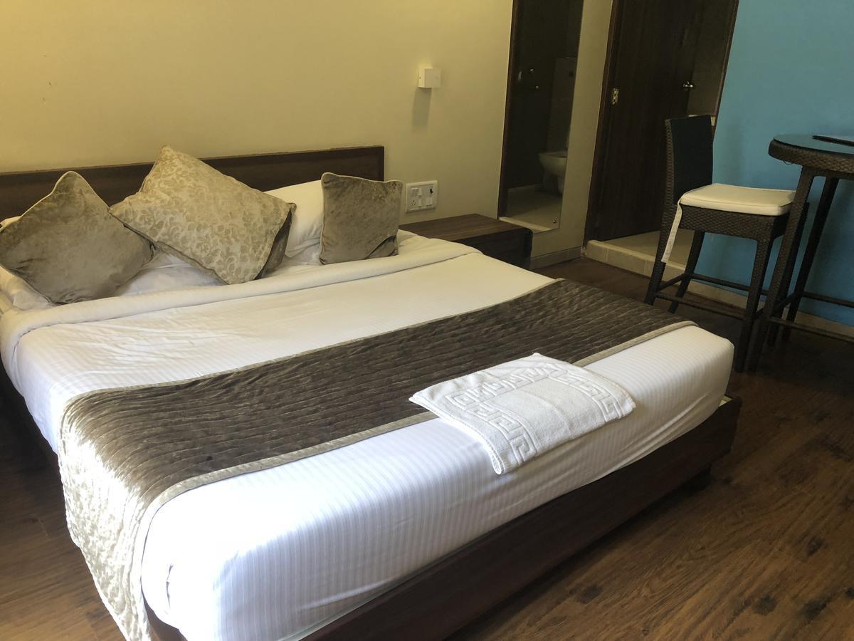 Coco Goa Hotel Arpora Buitenkant foto