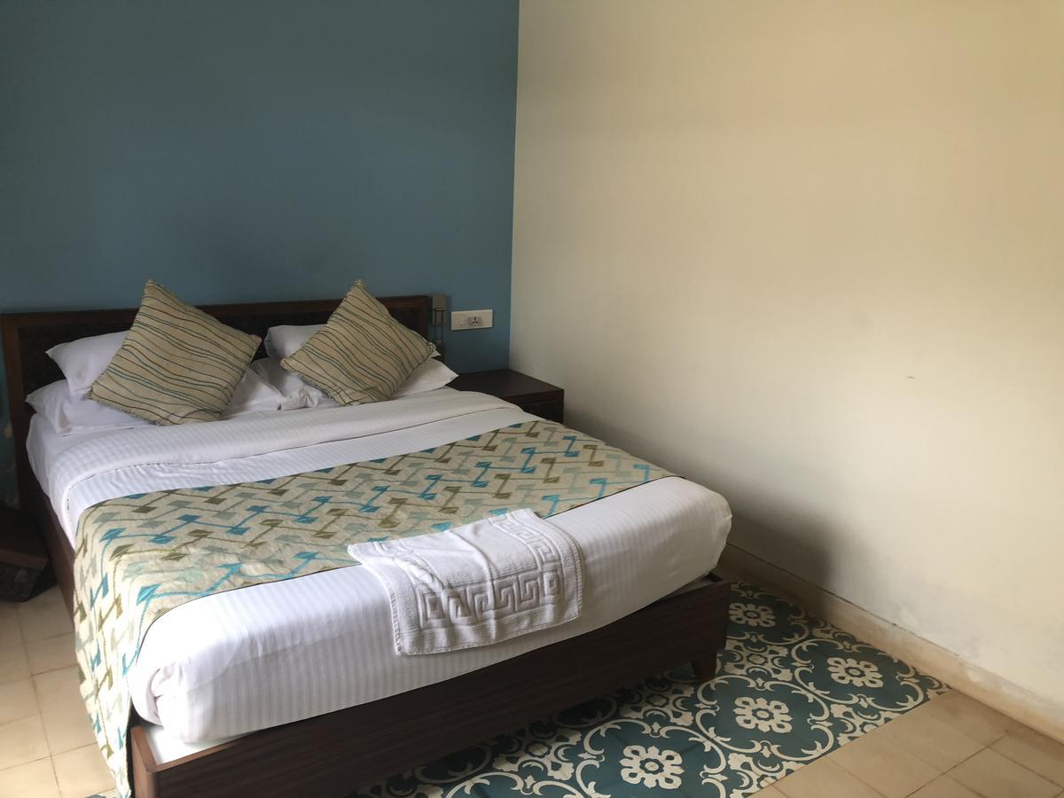 Coco Goa Hotel Arpora Buitenkant foto