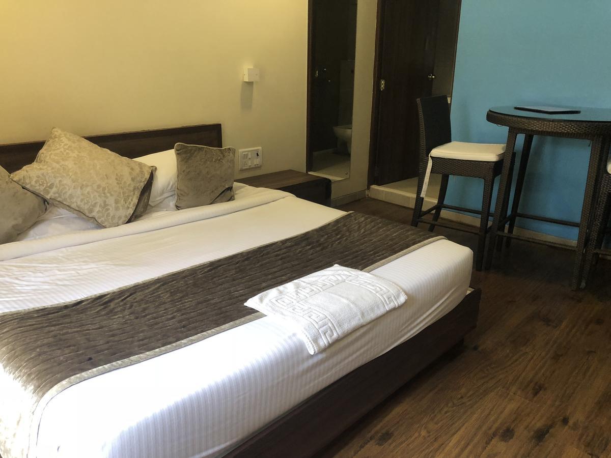 Coco Goa Hotel Arpora Buitenkant foto