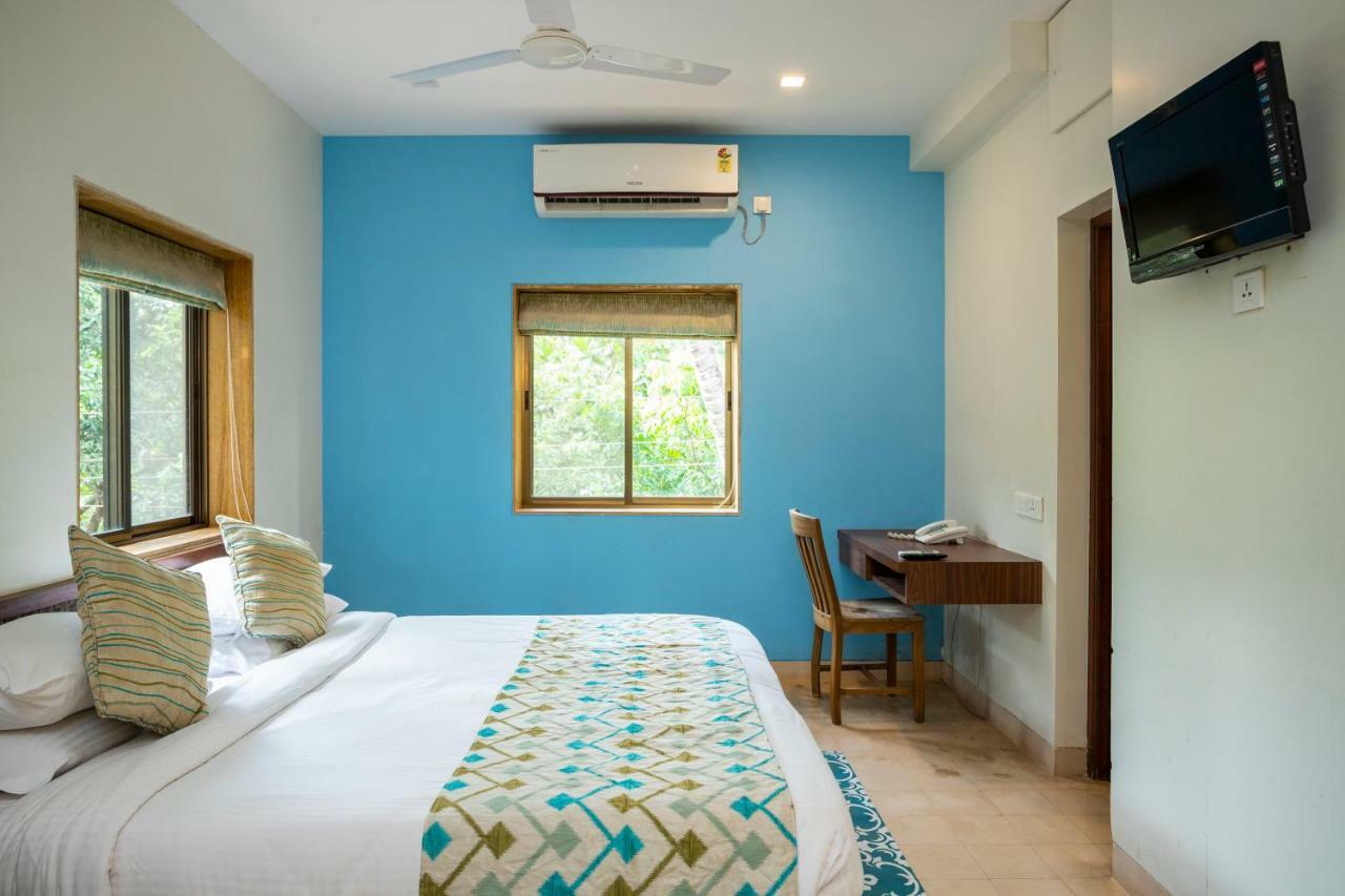 Coco Goa Hotel Arpora Buitenkant foto
